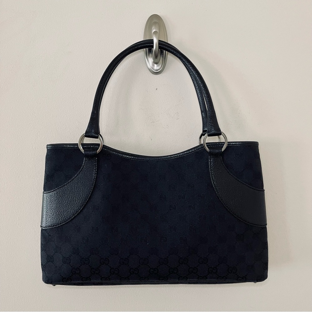 Gucci Black Signature Canvas & Leather shoulder bag.